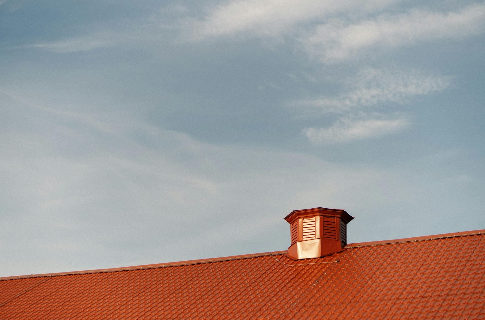 Large tiled roof with cupola — commercial scale